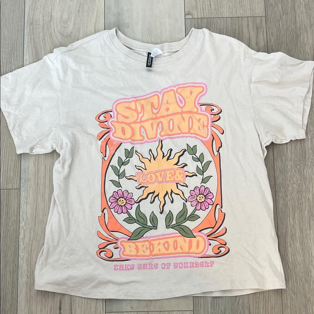 Divided Cream Tee with Vibrant Graphic